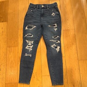 American Eagle Outfitters the Dream Jean Dark Blue Distressed Skinny size 4